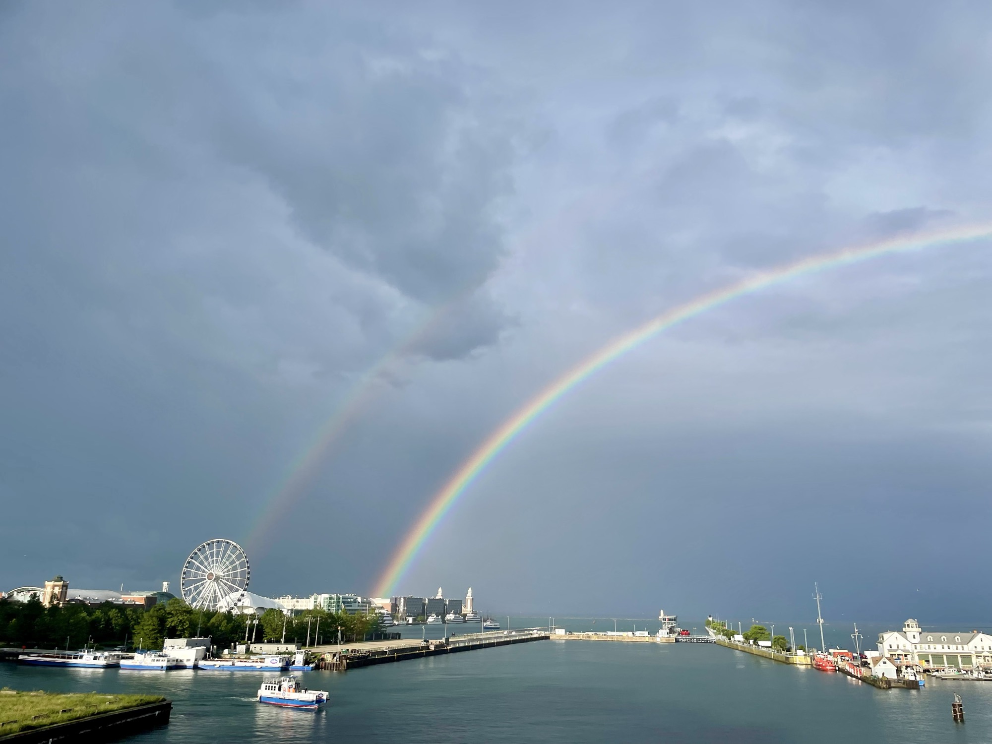 A rainbow over the lakefront and city harbor